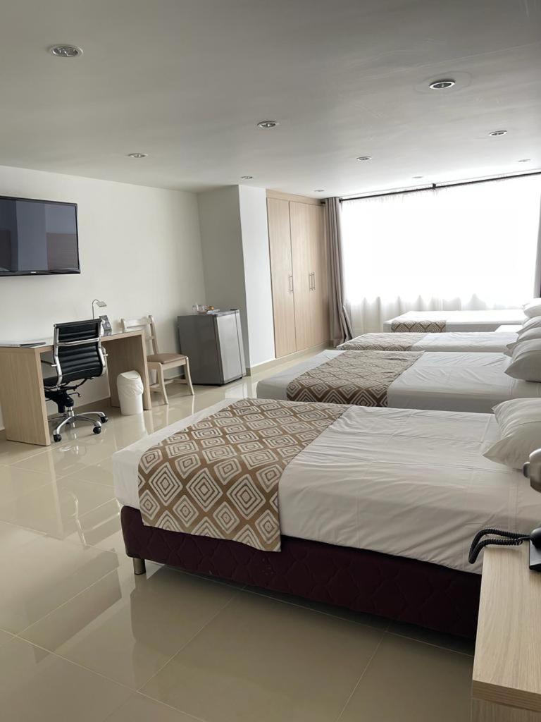 Hotel Juan Maria Tulua Ngoại thất bức ảnh