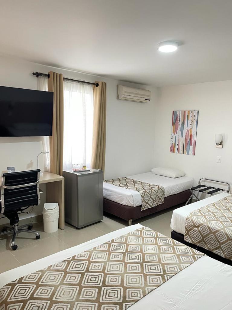 Hotel Juan Maria Tulua Ngoại thất bức ảnh