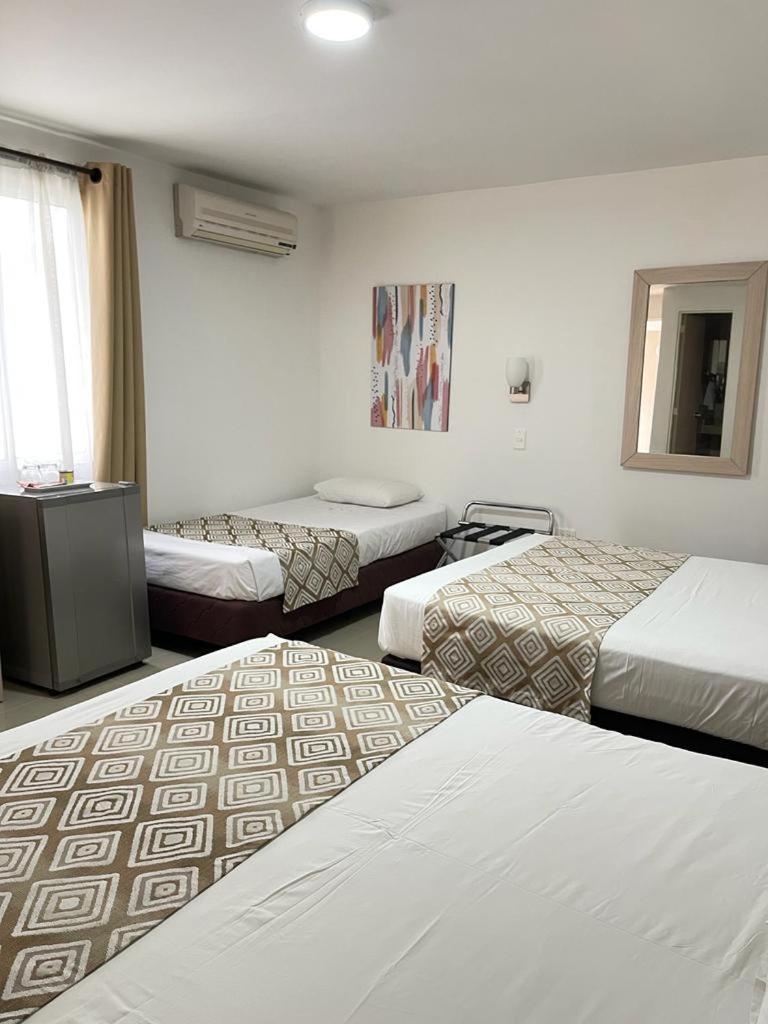 Hotel Juan Maria Tulua Ngoại thất bức ảnh