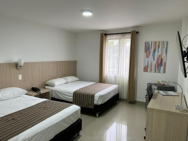 Hotel Juan Maria Tulua Ngoại thất bức ảnh