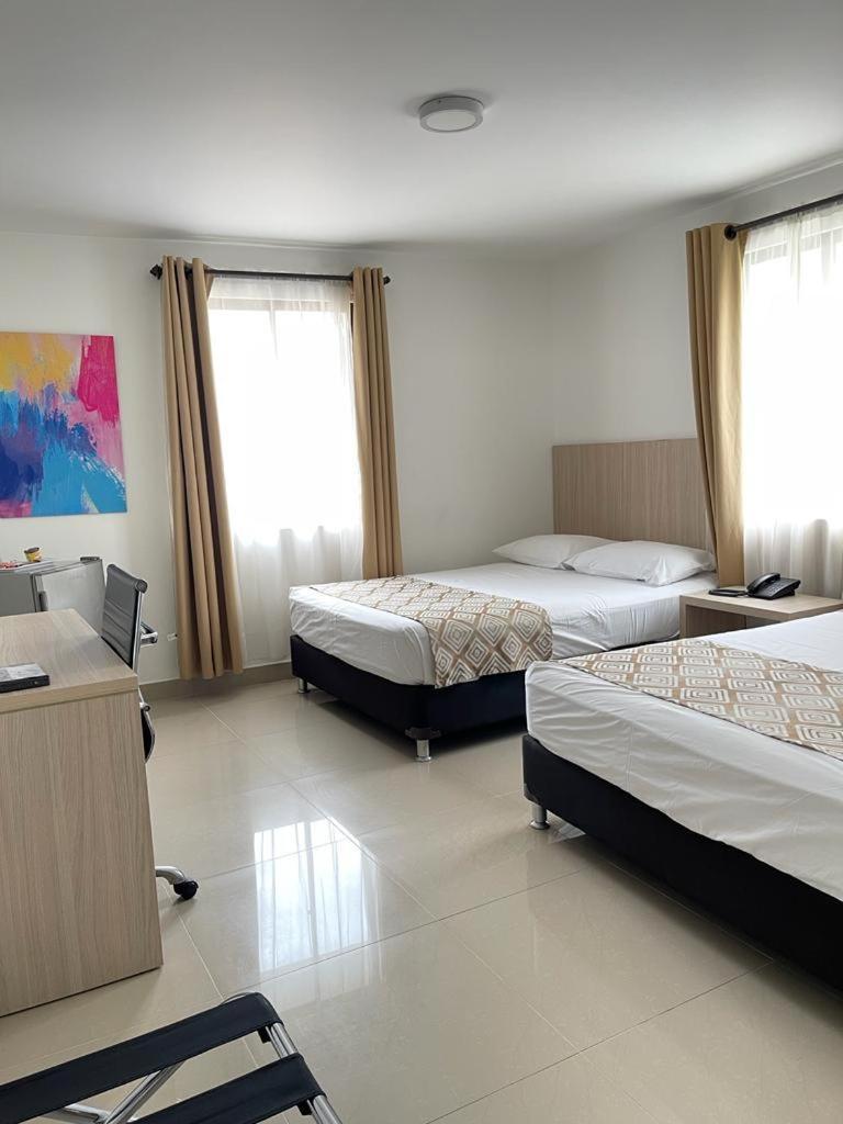 Hotel Juan Maria Tulua Ngoại thất bức ảnh