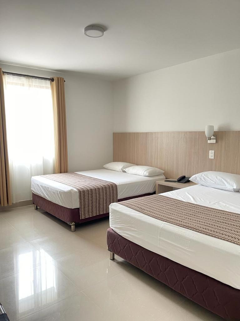 Hotel Juan Maria Tulua Ngoại thất bức ảnh