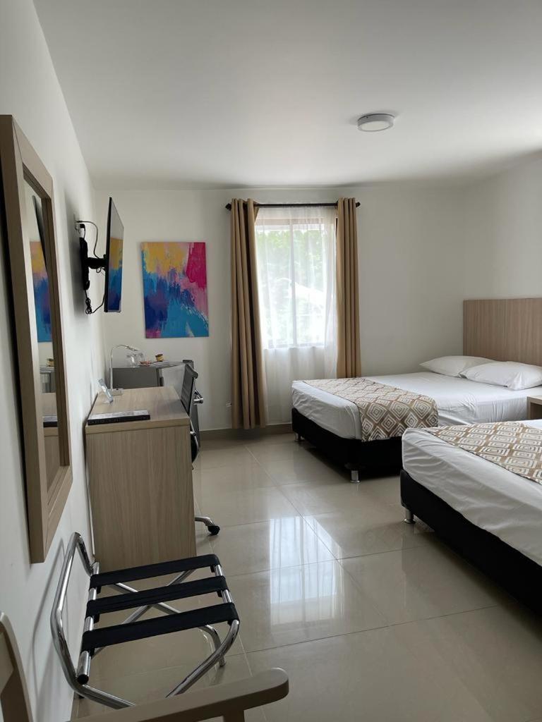 Hotel Juan Maria Tulua Ngoại thất bức ảnh